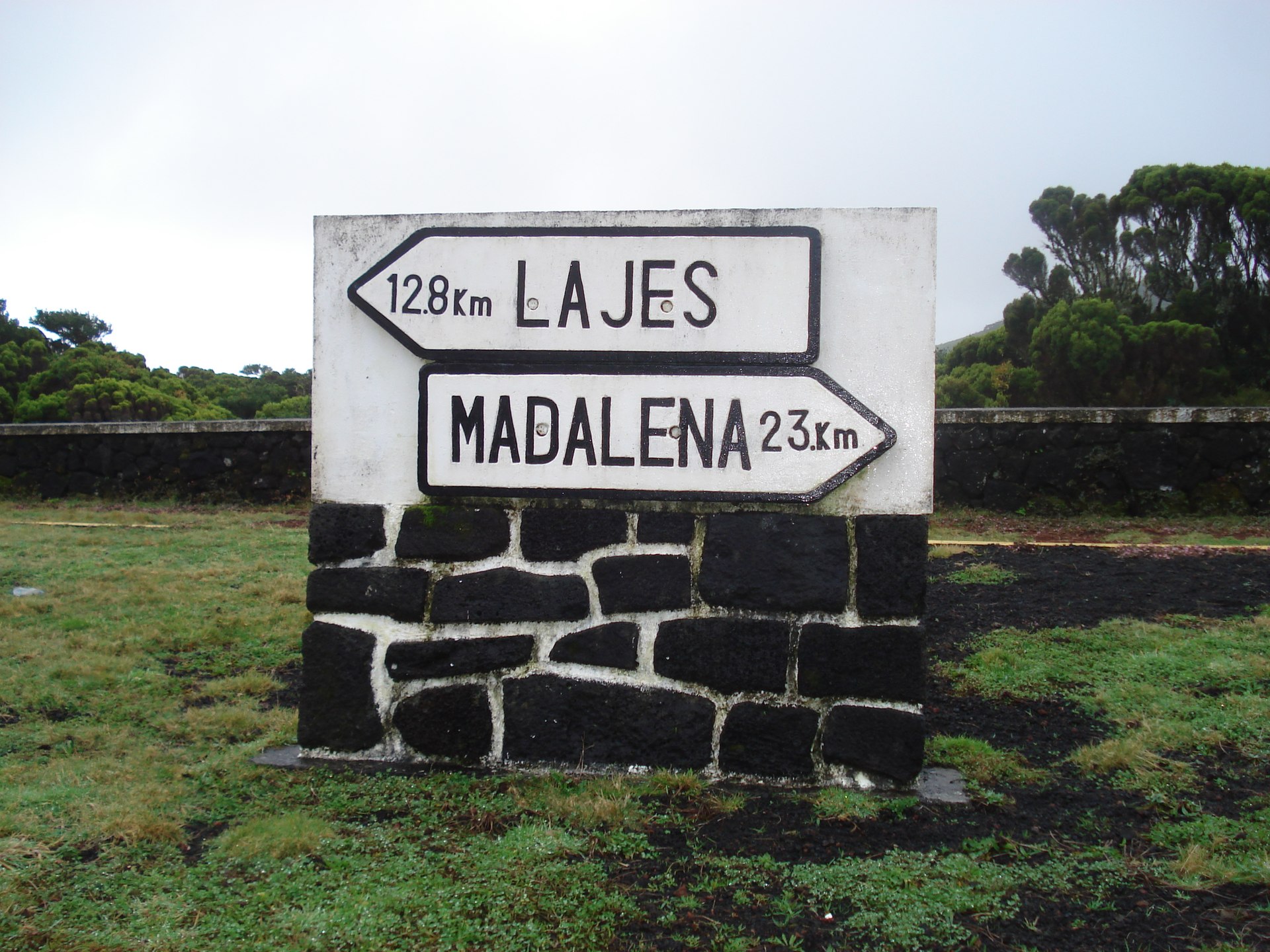 Road direction signs at a junction on the transversal road at São Roque do Pico